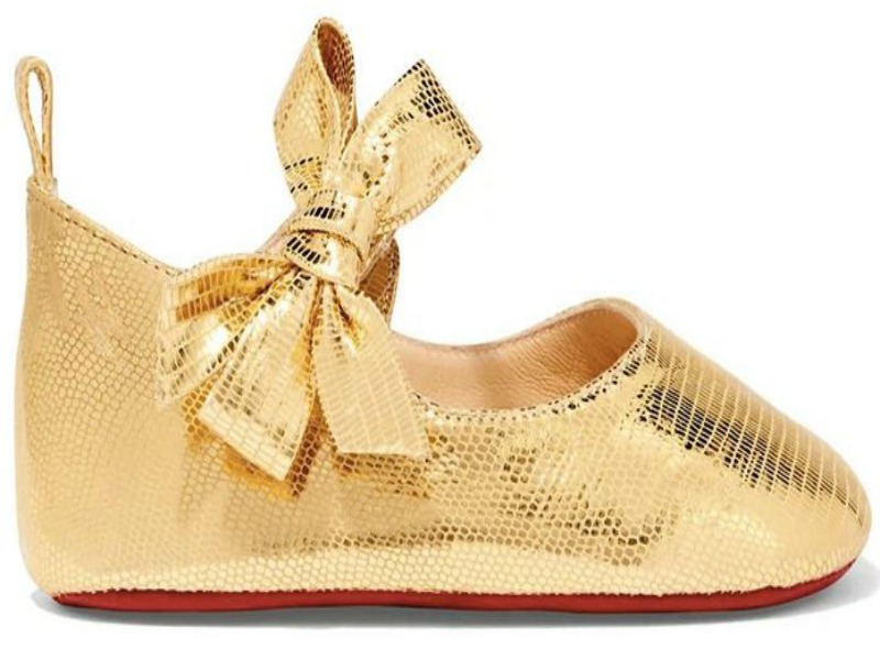 1. Louboutin Loubibaby gold shoes