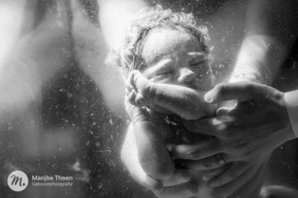 baby being born underwater