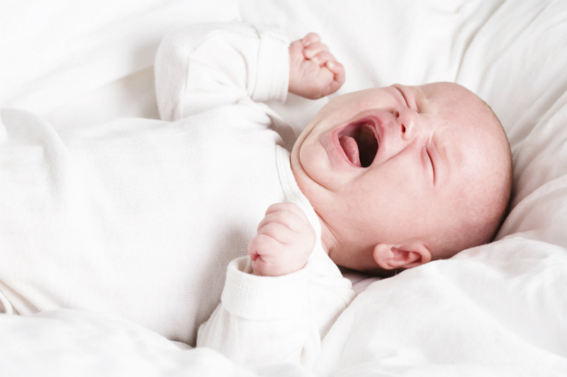 baby newborn crying bed sleep screaming stock sl