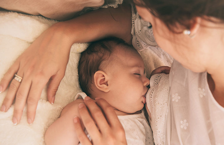 Baby breastfeeding - feature