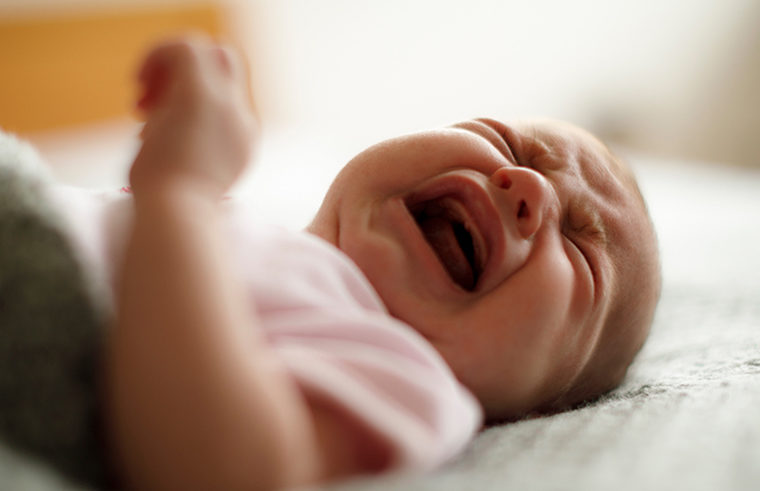 Newborn baby crying - feature
