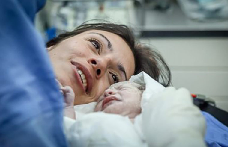 Woman newborn baby hospital - feature