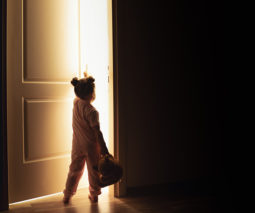 Young child sleep walking at night - feature