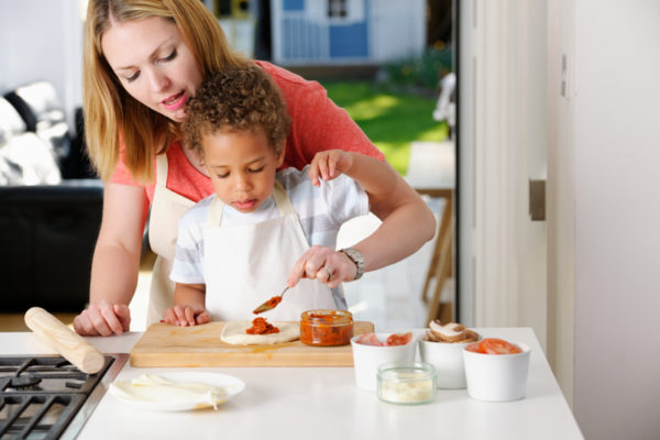professional-nanny-with-child-cooking-sl