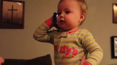 GIF baby talking on phone