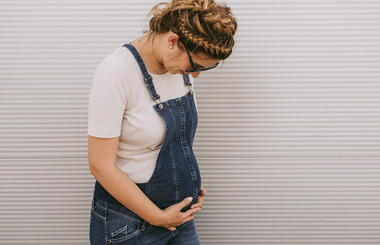 Pregnant women in overalls - feature