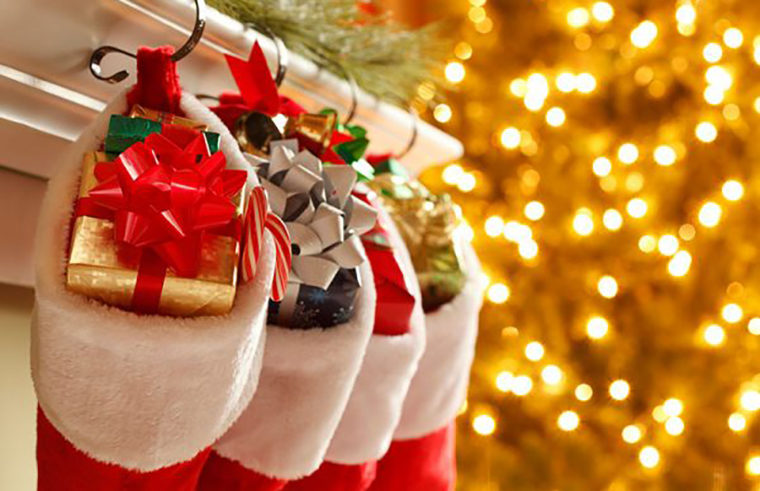Full Christmas stockings hanging