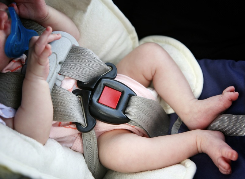 baby in car seat 5 point harness