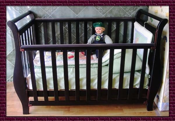 Recalled sleigh-type cot