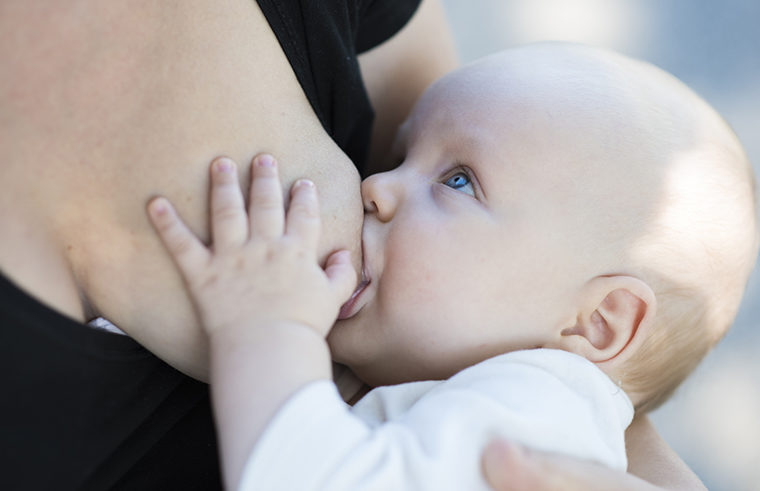 Baby breastfeeding - feature