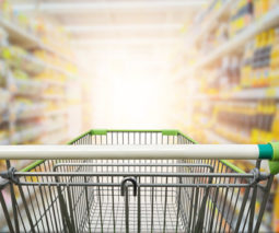 Supermarket trolley in aisle - feature
