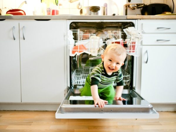 toddler in dishwasher