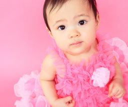 Asian baby dressed in pink tutu - feature