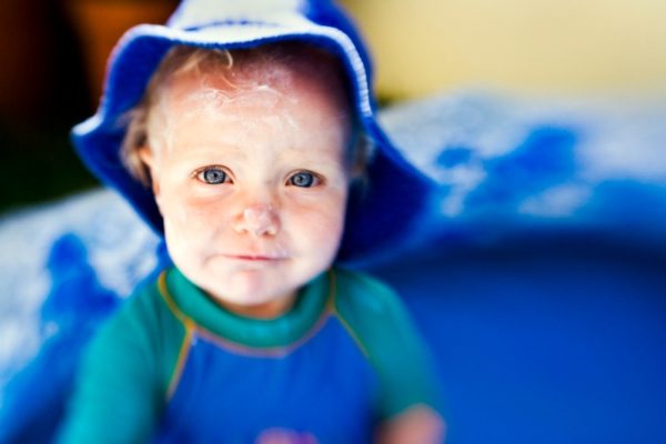 baby with sunscreen