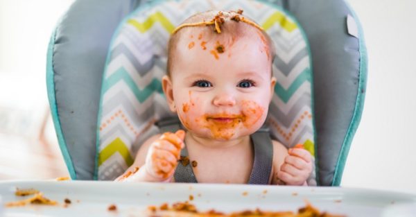 Baby eating spaghetti