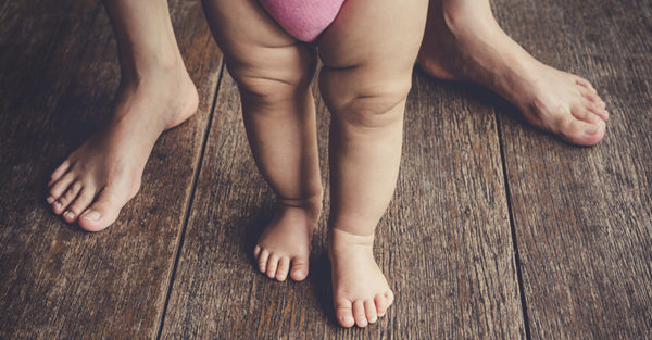 EDITORIAL: Baby and parent's feet
