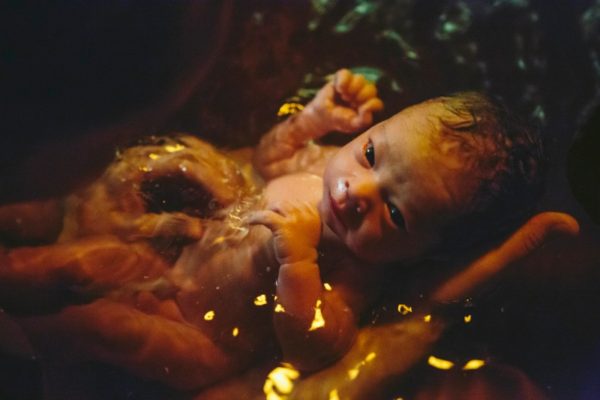 baby in birthing pool
