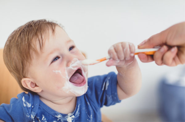 baby eating spoon