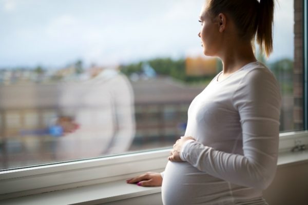 pregnant thoughtful woman