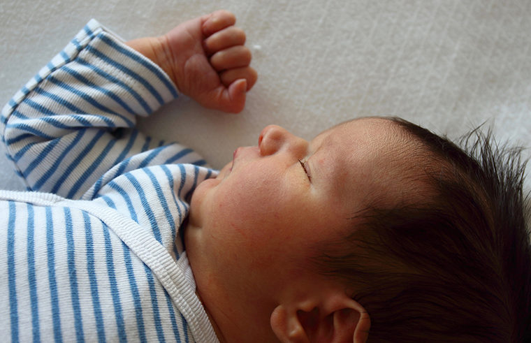 Newborn baby sleeping - feature
