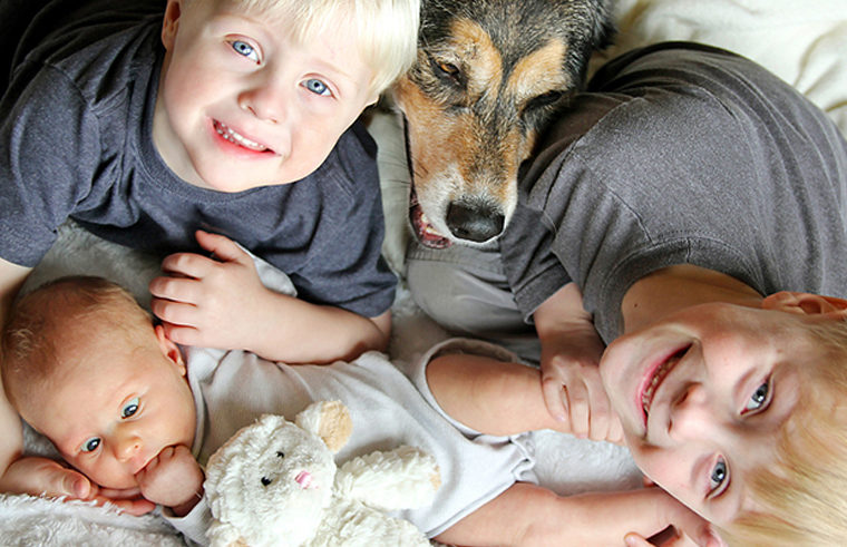Three children and dog