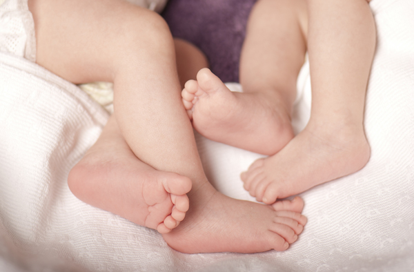 Two toddlers' feet