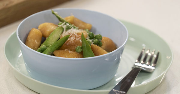 Sweet potato gnocchi with peas and asparagus recipe