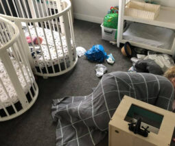 Mother asleep on floor of kids' bedroom - from Facebook post