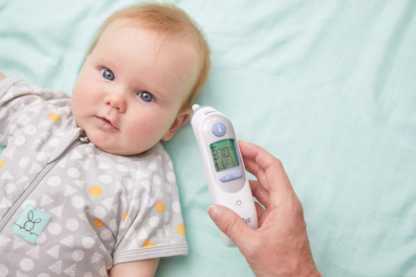taking baby's temperature with a Braun ThermoScan 7 ear thermometer