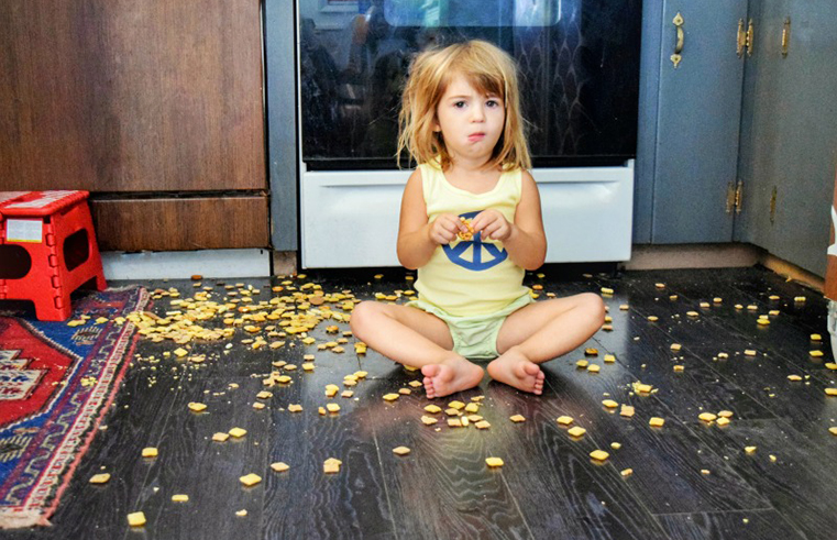 Child eating off the floor - feature