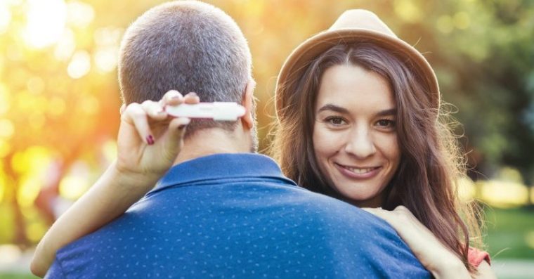 Couple with positive pregnancy test