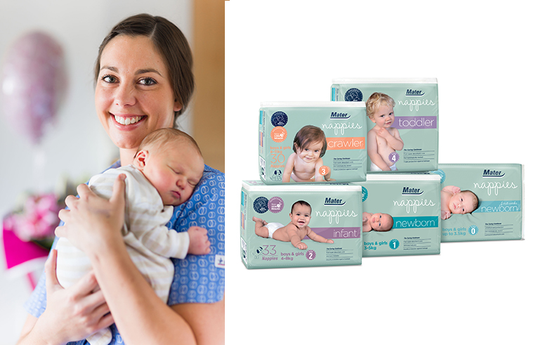 Midwife holding newborn baby plus nappy packs