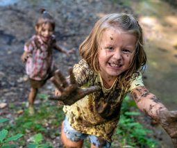 playing in mud - wide
