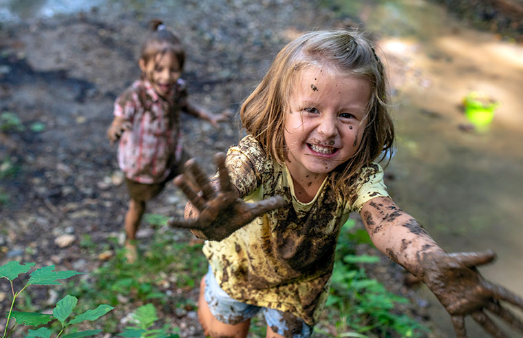 playing in mud - wide
