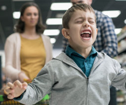Child having a tantrum in the supermarket
