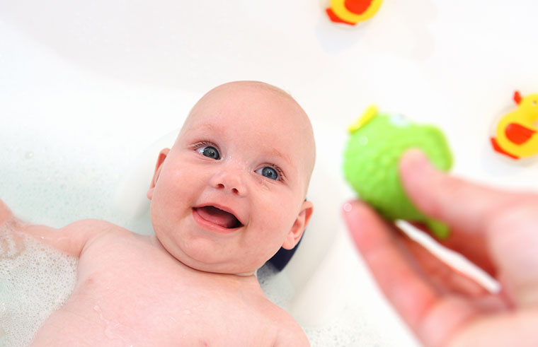 baby enjoying a bath