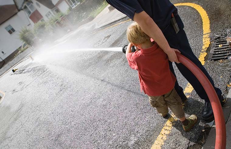 Child with hose