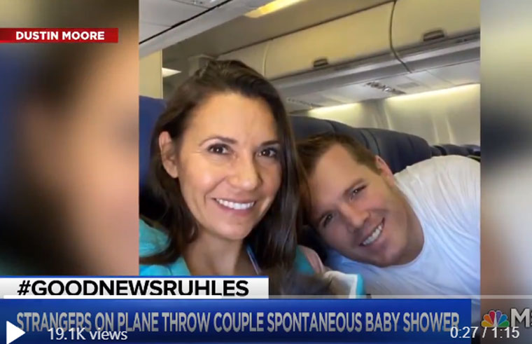 In-flight baby shower couple
