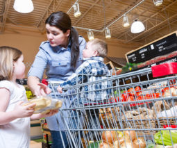 Mum with kids in supermarket