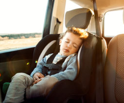 Toddler asleep in car seat