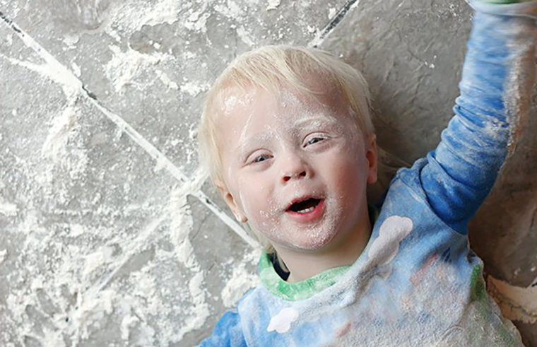 Toddler covered in flour - feature